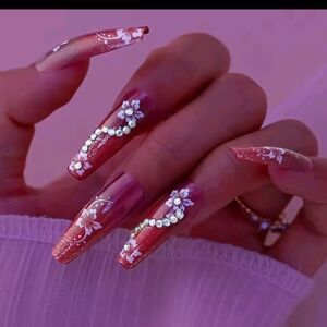 Elegant Floral Nail Art in Red and Pink